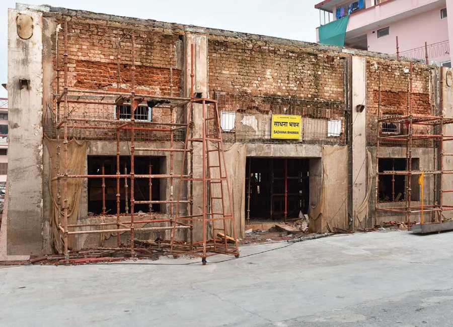 Scaffolding erected around the Sadhana Bhawan hall during reinforcement work